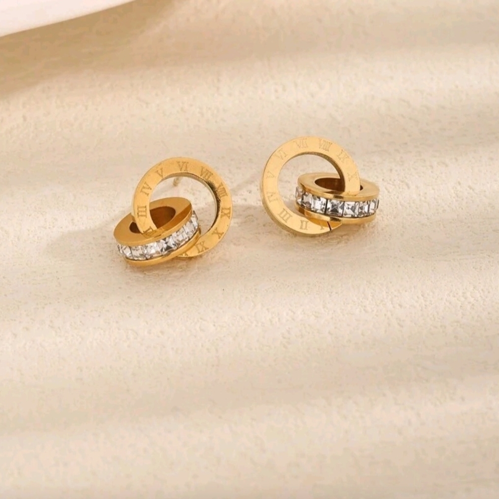 Elegant Gold and Silver Interlocking Earrings